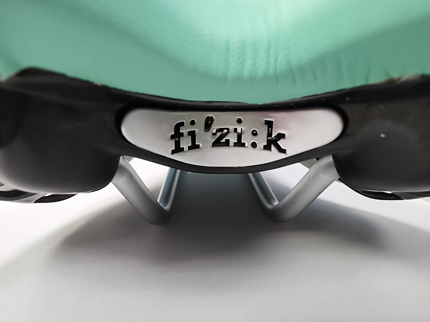 Fizik Aliante δ Saddle Silver Rail / Manganese 270x140mm  White/Tiffany Blue with Black Decal