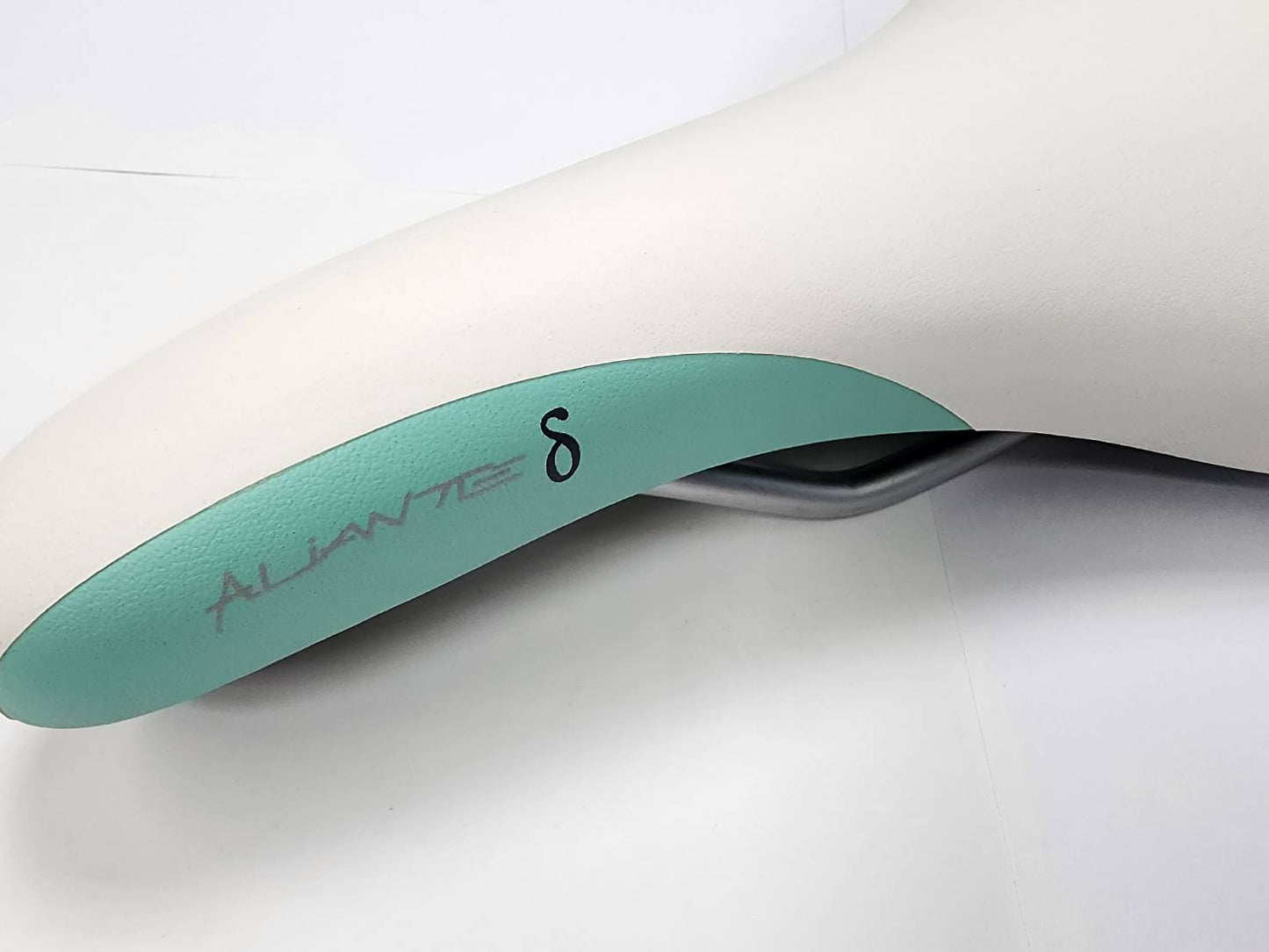 Fizik Aliante δ Saddle Silver Rail / Manganese 270x140mm  White/Tiffany Blue with Black Decal